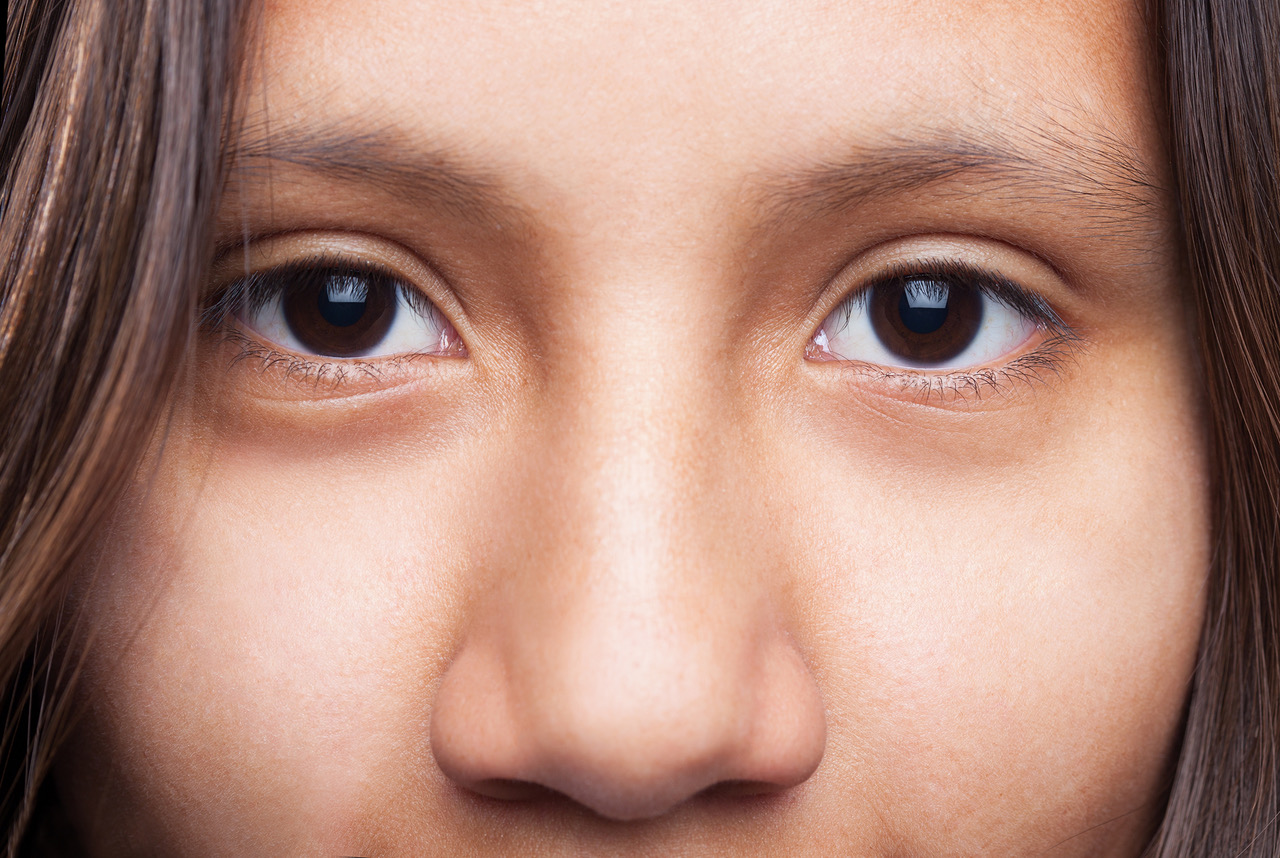 happy latin girl eyes closeup