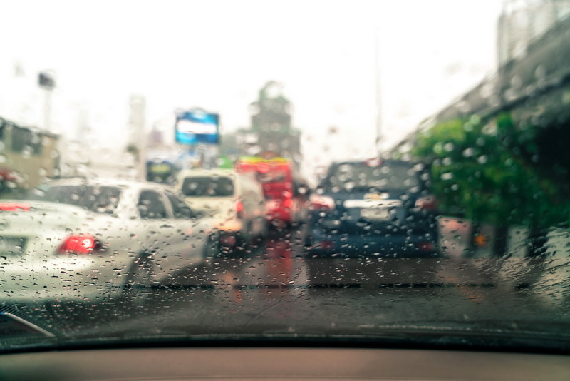 abstract blur rain drops on car glass - vintage effect filter